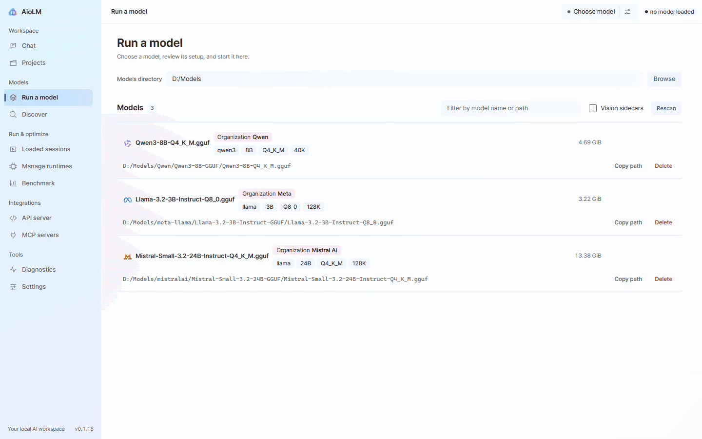 The AioLM desktop app on its Run a model page, listing four public GGUF demonstration models with Qwen3-8B-Instruct loaded on a llama.cpp runtime.